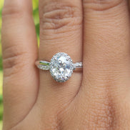Lab Grown Oval Cut Halo Engagement Ring With Twisted Band