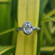 Lab Grown Oval Cut Halo Engagement Ring With Twisted Band