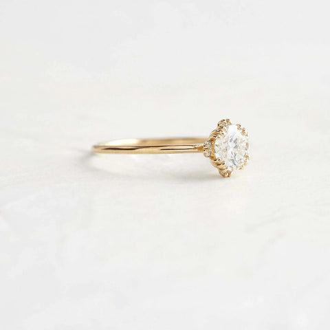 Colorless Moissanite Round Cut Hidden Accent Engagement Ring