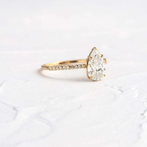 Pear Cut Pave Set Moissanite Engagement Ring