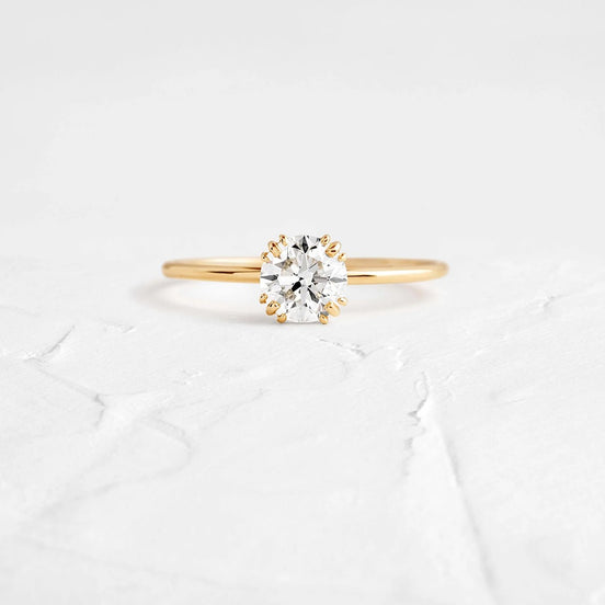 Moissanite Round Cut Hidden Accent Proposal Ring