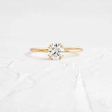 Moissanite Round Cut Hidden Accent Proposal Ring