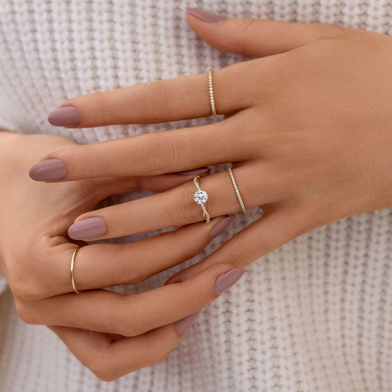 Round Cut Twisted Moissanite Engagement Ring