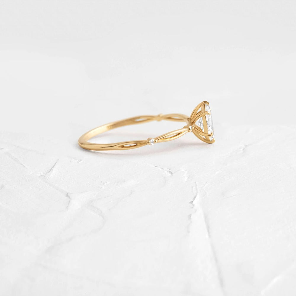 Twisted Marquise Cut Colorless Moissanite Proposal Ring