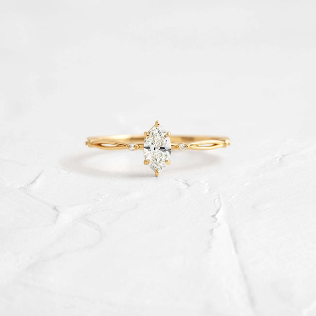 Twisted Marquise Cut Colorless Moissanite Proposal Ring