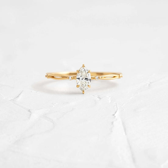 Twisted Marquise Cut Colorless Moissanite Proposal Ring