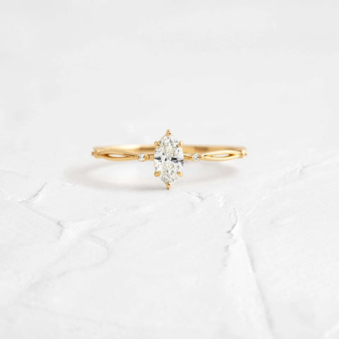 Twisted Marquise Cut Colorless Moissanite Proposal Ring