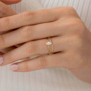Twisted Marquise Cut Colorless Moissanite Proposal Ring