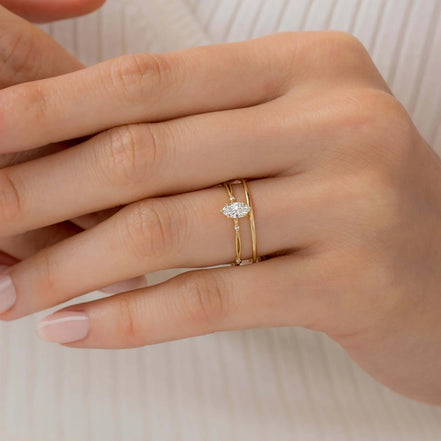 Twisted Marquise Cut Colorless Moissanite Proposal Ring