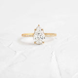 Pear Cut Pave Set Moissanite Engagement Ring