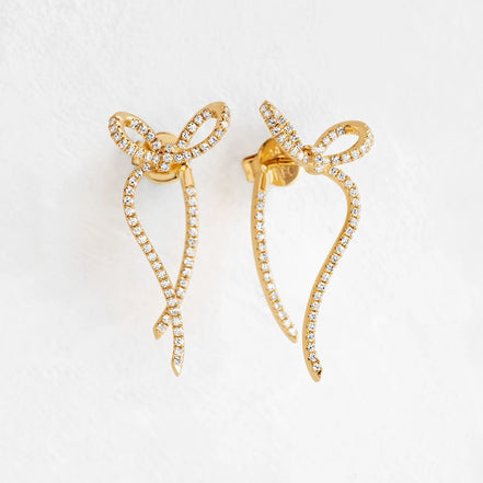 Colorless Moissanite Round Cut Bow Style Stud Earrings
