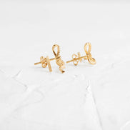 Colorless Moissanite Round Cut Bow Style Stud Earrings