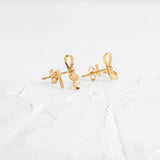 Colorless Moissanite Round Cut Bow Style Stud Earrings
