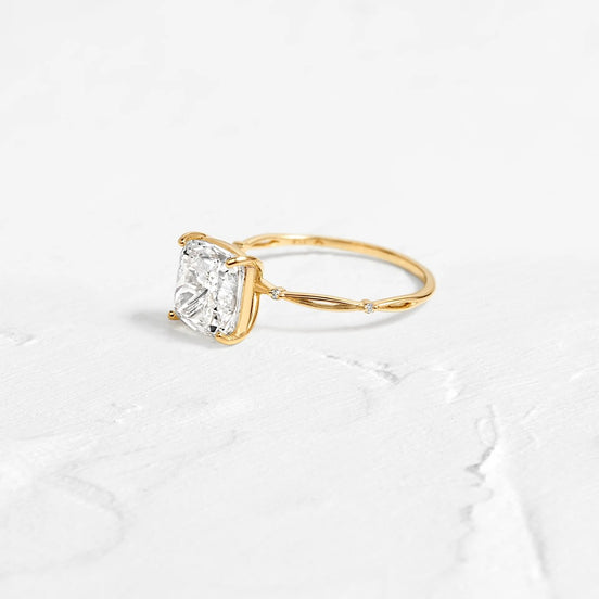 Solitaire Cushion Cut Side Accent Moissanite Engagement Ring