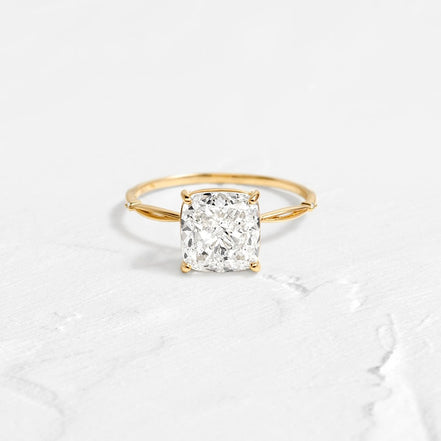 Solitaire Cushion Cut Side Accent Moissanite Engagement Ring