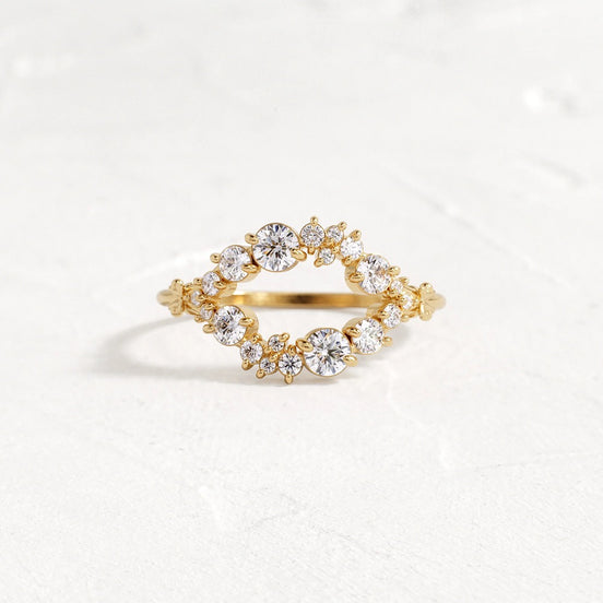 Round Cut Double Curved Colorless Moissanite Proposal Ring