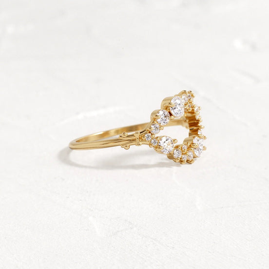 Round Cut Double Curved Colorless Moissanite Proposal Ring