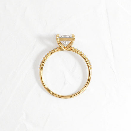 Side Accent Princess Cut D Color Moissanite Proposal Ring