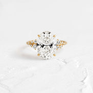 Oval Cut Pave Set Moissanite Engagement Ring