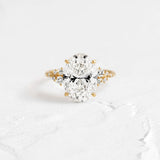 Oval Cut Pave Set Moissanite Engagement Ring