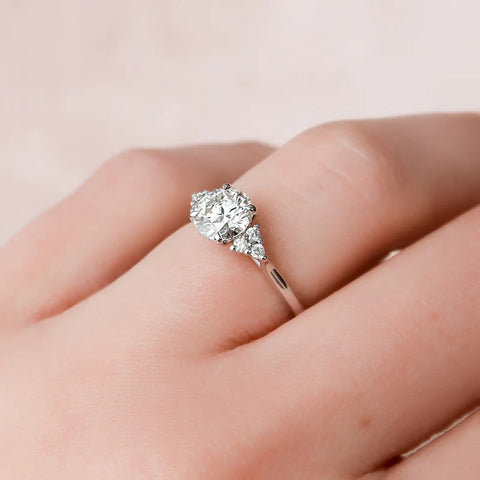 D Color Moissanite Round Cut Side Accent Engagement Ring