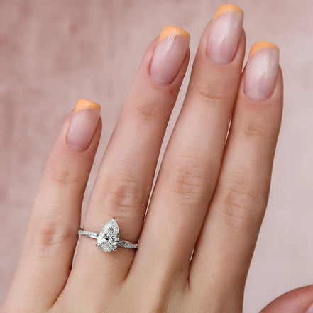Twisted Style Pear Cut Moissnaite Engagement Ring