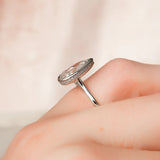 Pear Cut Bezel Set Moissnaite Hidden Accent Ring