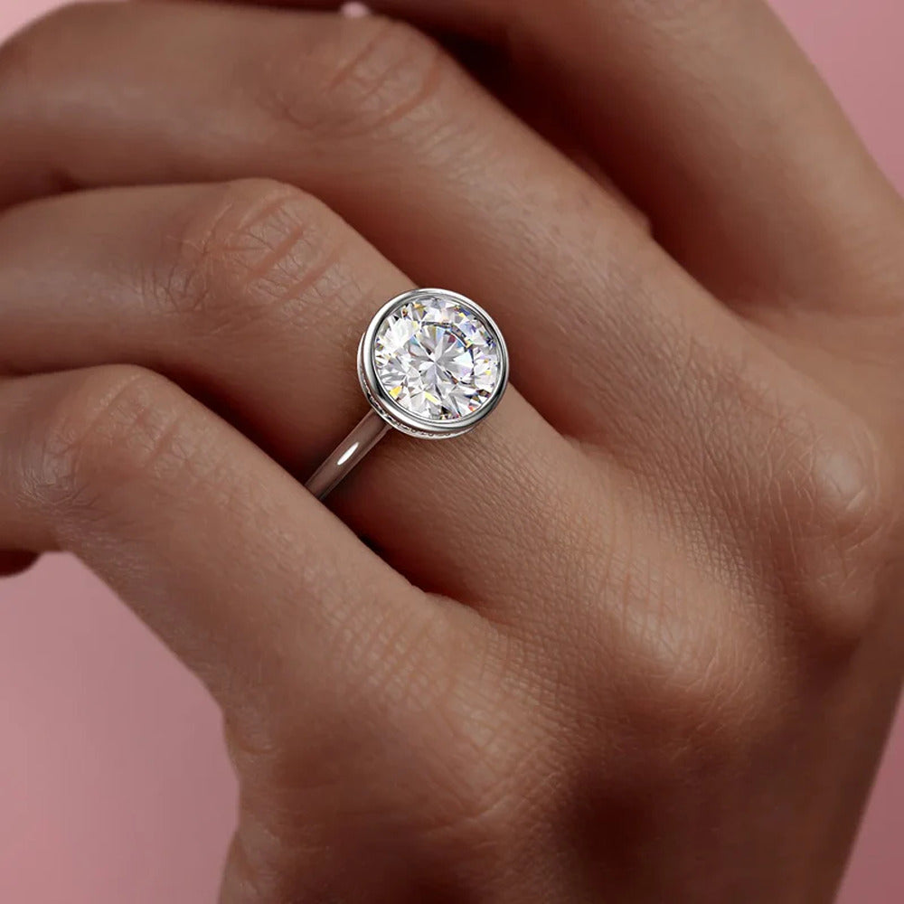 Bezel Set With Hidden Accent Round Cut Moissanite Ring