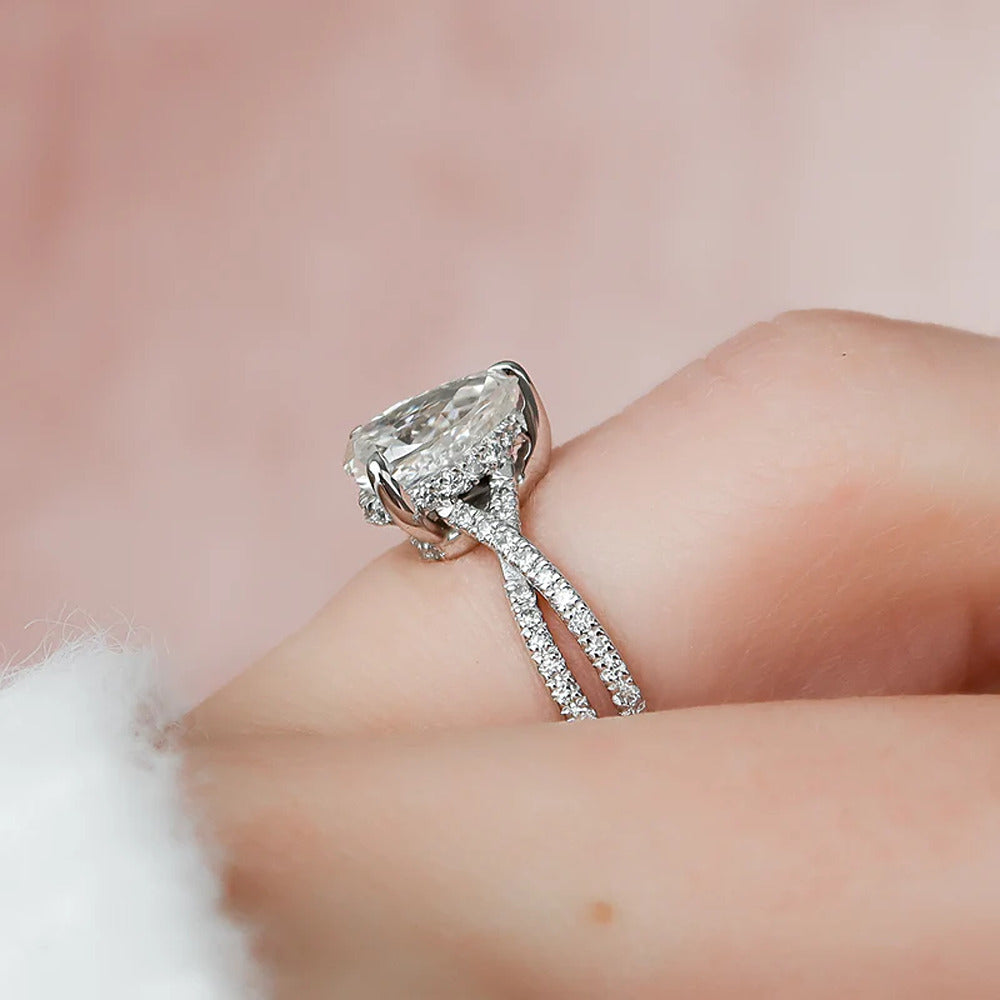 Pear Cut Hidden Accent Twisted Band Moissnaite Ring