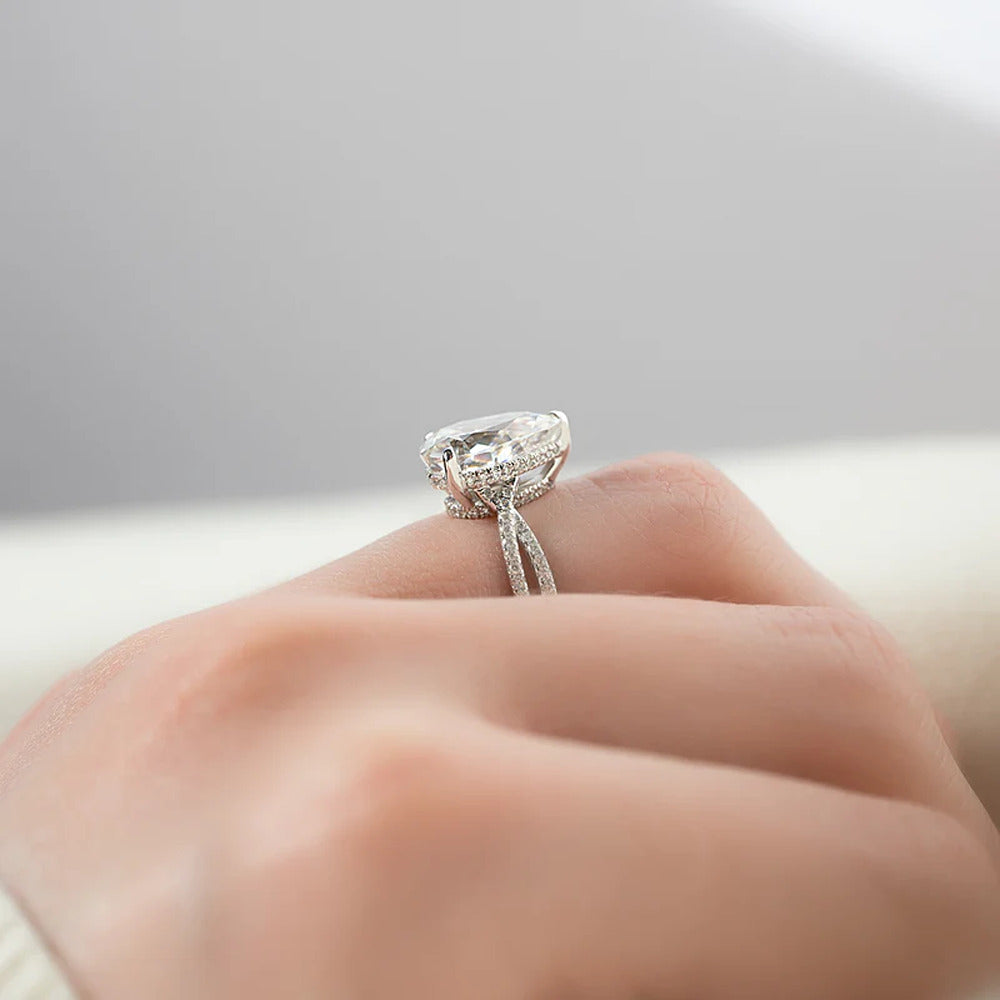Pear Cut Hidden Accent Twisted Band Moissnaite Ring