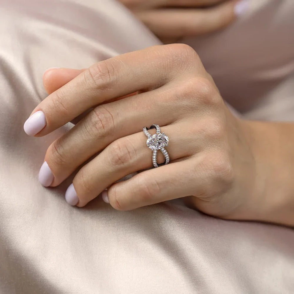 Oval Cut Criss Cross Moissanite Engagement Ring