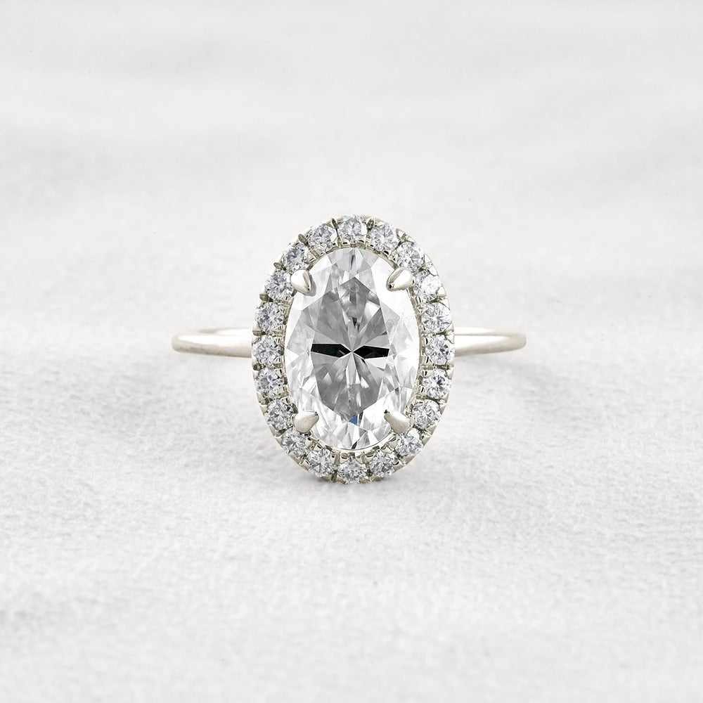 Hidden Accent Oval Cut Moissnaite Engagement Ring