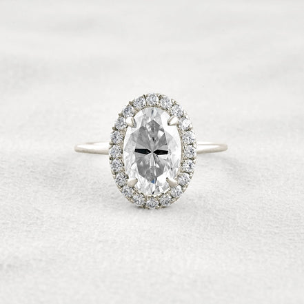 Hidden Accent Oval Cut Moissnaite Engagement Ring