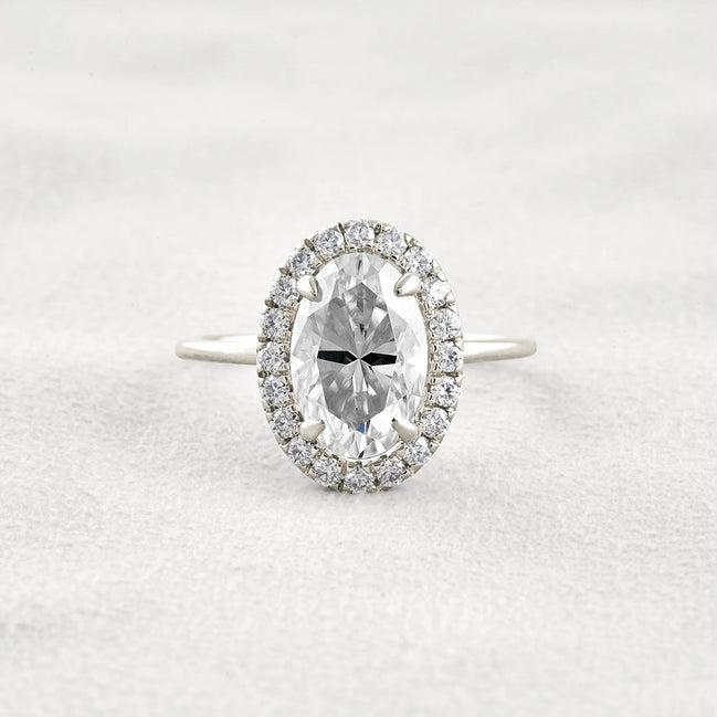 Hidden Accent Oval Cut Moissnaite Engagement Ring