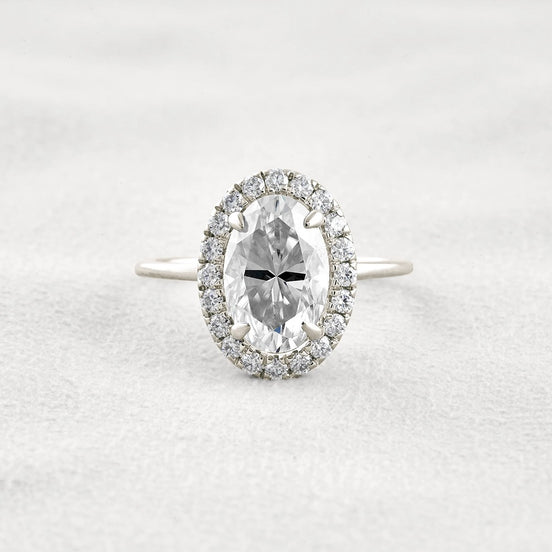 Hidden Accent Oval Cut Moissnaite Engagement Ring