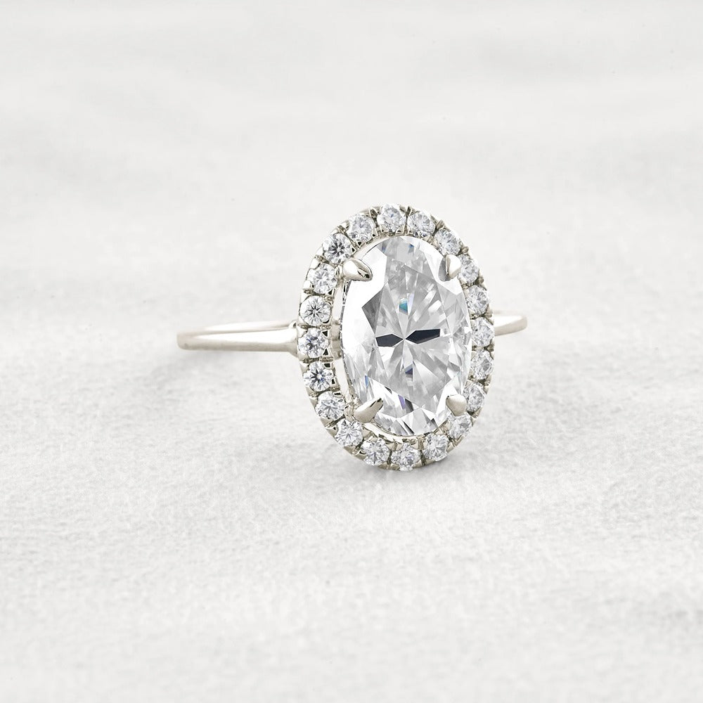 Hidden Accent Oval Cut Moissnaite Engagement Ring