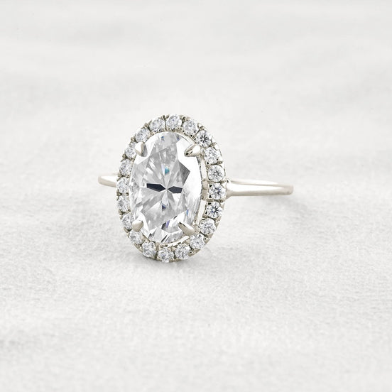 Hidden Accent Oval Cut Moissnaite Engagement Ring