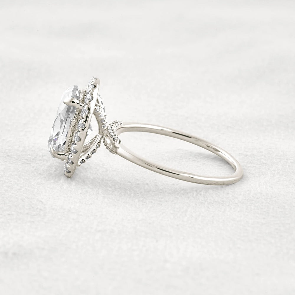Hidden Accent Oval Cut Moissnaite Engagement Ring