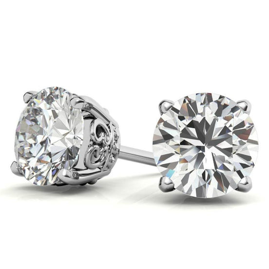 Timeless Four Prong Round Moissanite Stud Earrings