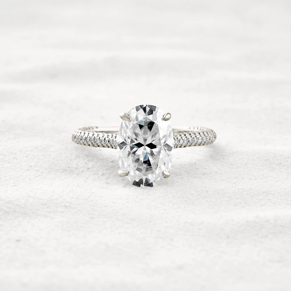 Hidden Accent & Pave Set Oval Cut Moissanite Wedding Ring