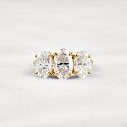 Oval Cut Three Stone & Hidden Accent Moissanite Engagement Ring