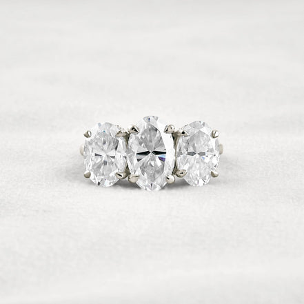 Oval Cut Three Stone & Hidden Accent Moissanite Engagement Ring