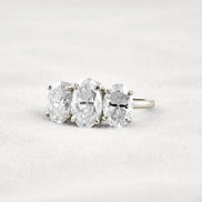 Oval Cut Three Stone & Hidden Accent Moissanite Engagement Ring