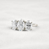 Oval Cut Three Stone & Hidden Accent Moissanite Engagement Ring