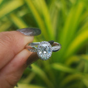 Lab Grown Oval Cut Halo Engagement Ring With Twisted Band