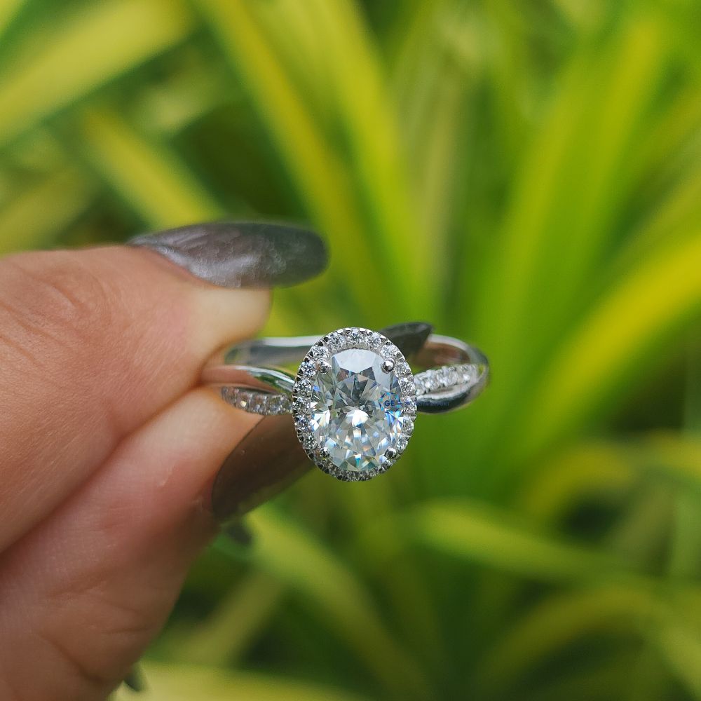 Lab Grown Oval Cut Halo Engagement Ring With Twisted Band