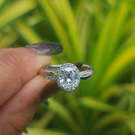 Lab Grown Oval Cut Halo Engagement Ring With Twisted Band