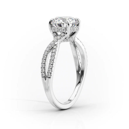 Pear Cut Hidden Accent Twisted Band Moissnaite Ring