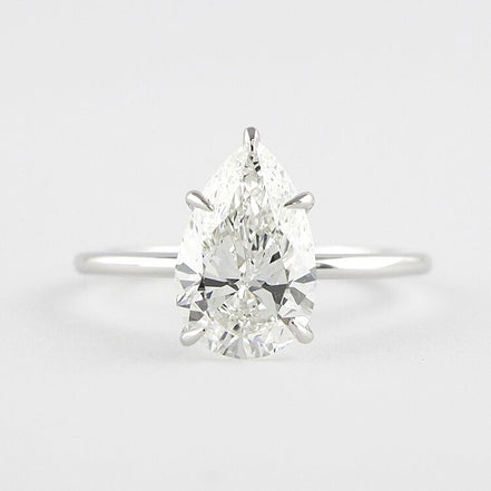 Colorless Moissanite Pear Cut Solitaire Engagement Ring