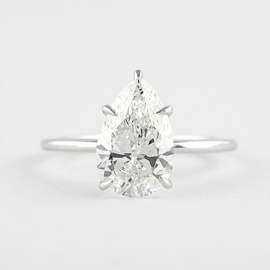 Colorless Moissanite Pear Cut Solitaire Engagement Ring
